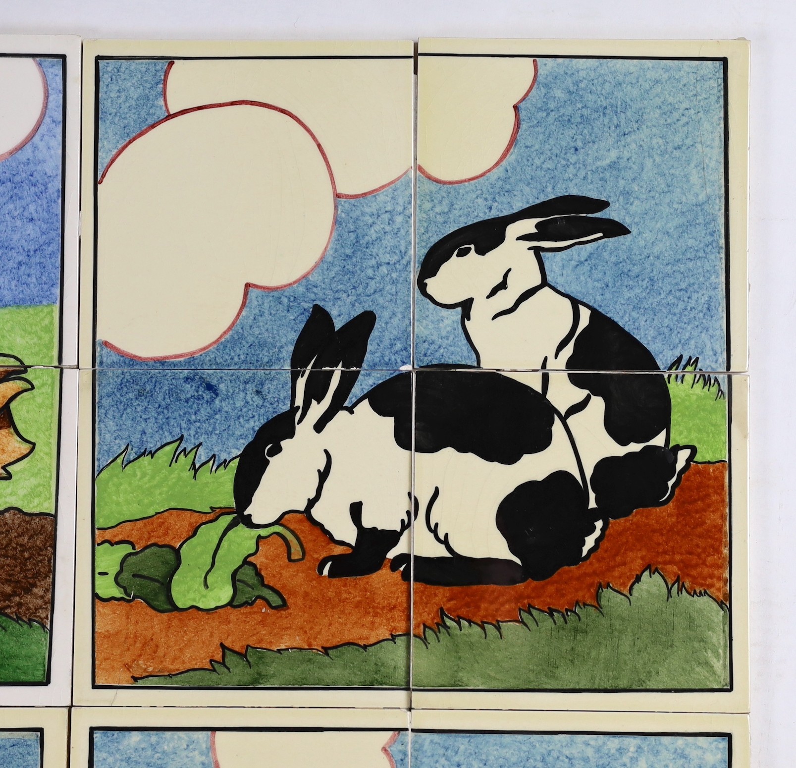 E.E. Strickland for Carter & Co, Poole pottery, six sets of four tile panels of animals and farm scenes, each tile 15.2cm (6in.) square and each set of four tiles 61cm square, minor faults